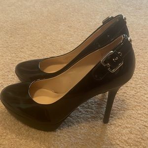 Guess black patent leather platform stiletto heels . Worn 3xs.